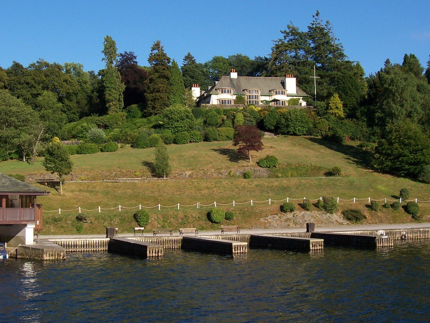 Broad Leys above Windermere: Voysey's white roughcast house seen across the lake it was designed to face