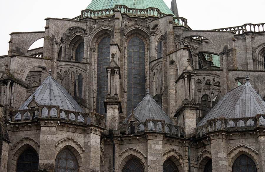 Apse of Chartres Cathedral with tiers of flying buttresses rising to pinnacled outer piers